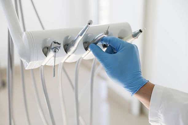 Professional Tooth Extraction technician working in McAdenville, NC